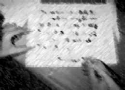 hands writing with a quill