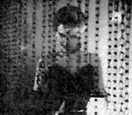 Janette seated at a table in the Raven