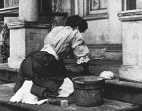woman scrubbing steps